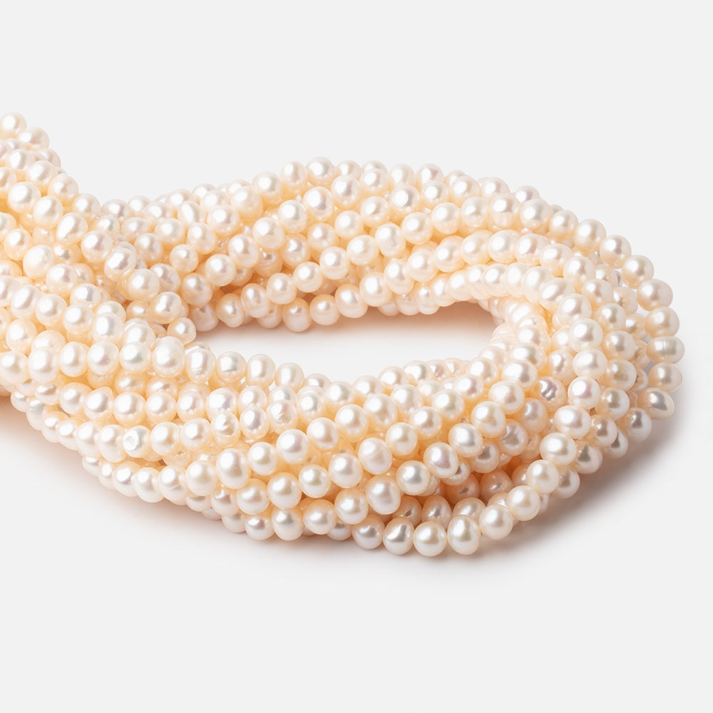 6x5-7x6mm Cream Rose' Off Round Freshwater Pearls 16 inch 71 pcs (ONLINE ORDER ONLY)