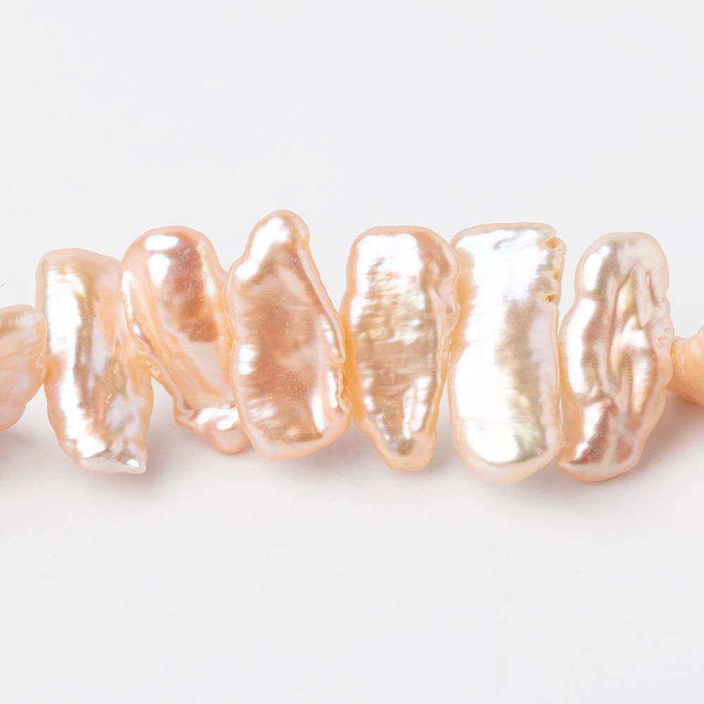 12x7-18x8mm Rosy Peach Side Drill Biwa Freshwater Pearls 16 inch 54 Beads (ONLINE ORDER ONLY)