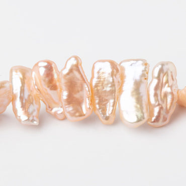 12x7-18x8mm Rosy Peach Side Drill Biwa Freshwater Pearls 16 inch 54 Beads (ONLINE ORDER ONLY)