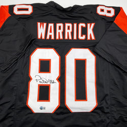 Autographed/Signed Peter Warrick Cincinnati Black Football Jersey Beckett BAS COA