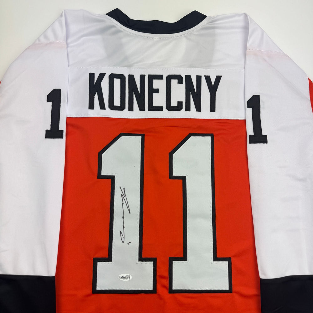 Autographed/Signed Travis Konecny Philadelphia Orange Hockey Jersey JSA COA
