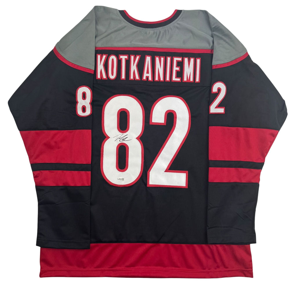 Autographed/Signed Jesperi Kotkaniemi Carolina Black Hockey Jersey Beckett BAS COA (ONLINE ORDER ONLY)