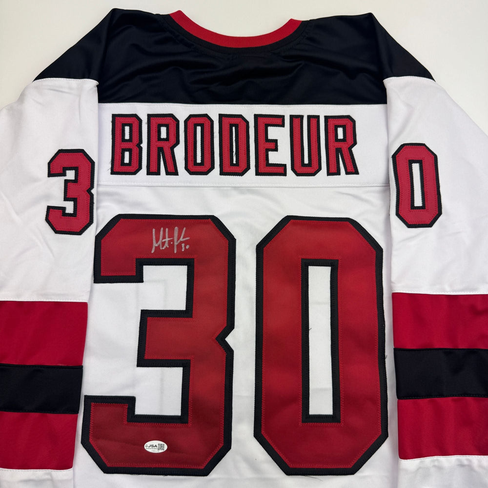 Autographed/Signed Martin Brodeur New Jersey NJ White Hockey Jersey Beckett BAS COA (ONLINE ORDER ONLY)