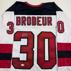 Autographed/Signed Martin Brodeur New Jersey NJ White Hockey Jersey Beckett BAS COA (ONLINE ORDER ONLY)