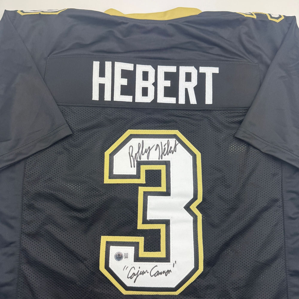 Autographed/Signed Bobby Hebert Cajun Cannon New Orleans Black Football Jersey Beckett BAS COA (ONLINE ORDER ONLY)