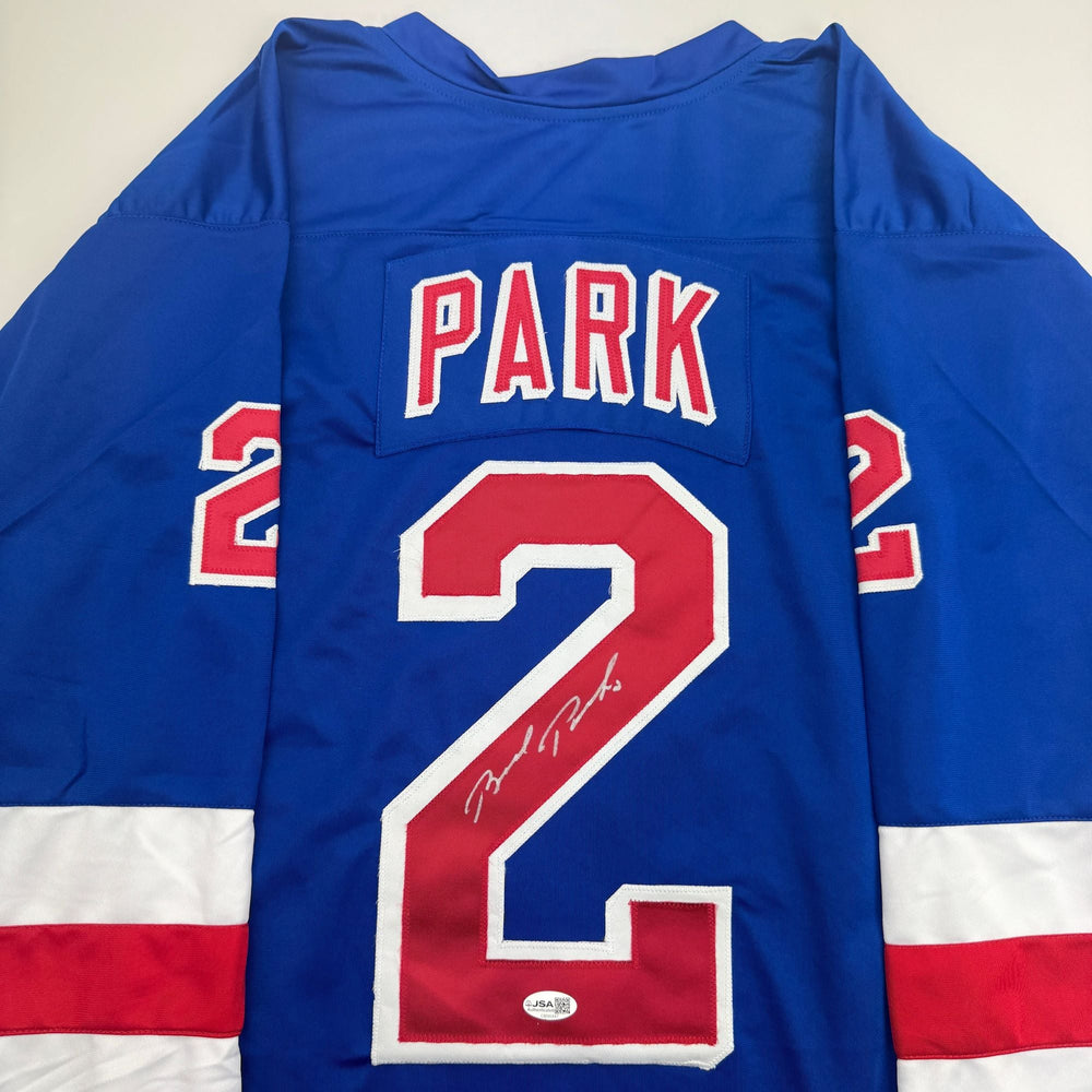 Autographed/Signed Brad Park New York Blue Hockey Jersey JSA COA (ONLINE ORDER ONLY)