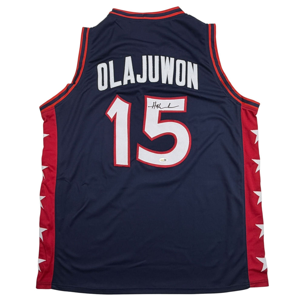 Autographed/Signed Hakeem Olajuwon United States USA Olympics Blue Basketball Jersey JSA COA (ONLINE ORDER ONLY)