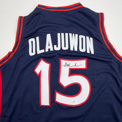 Autographed/Signed Hakeem Olajuwon United States USA Olympics Blue Basketball Jersey JSA COA (ONLINE ORDER ONLY)