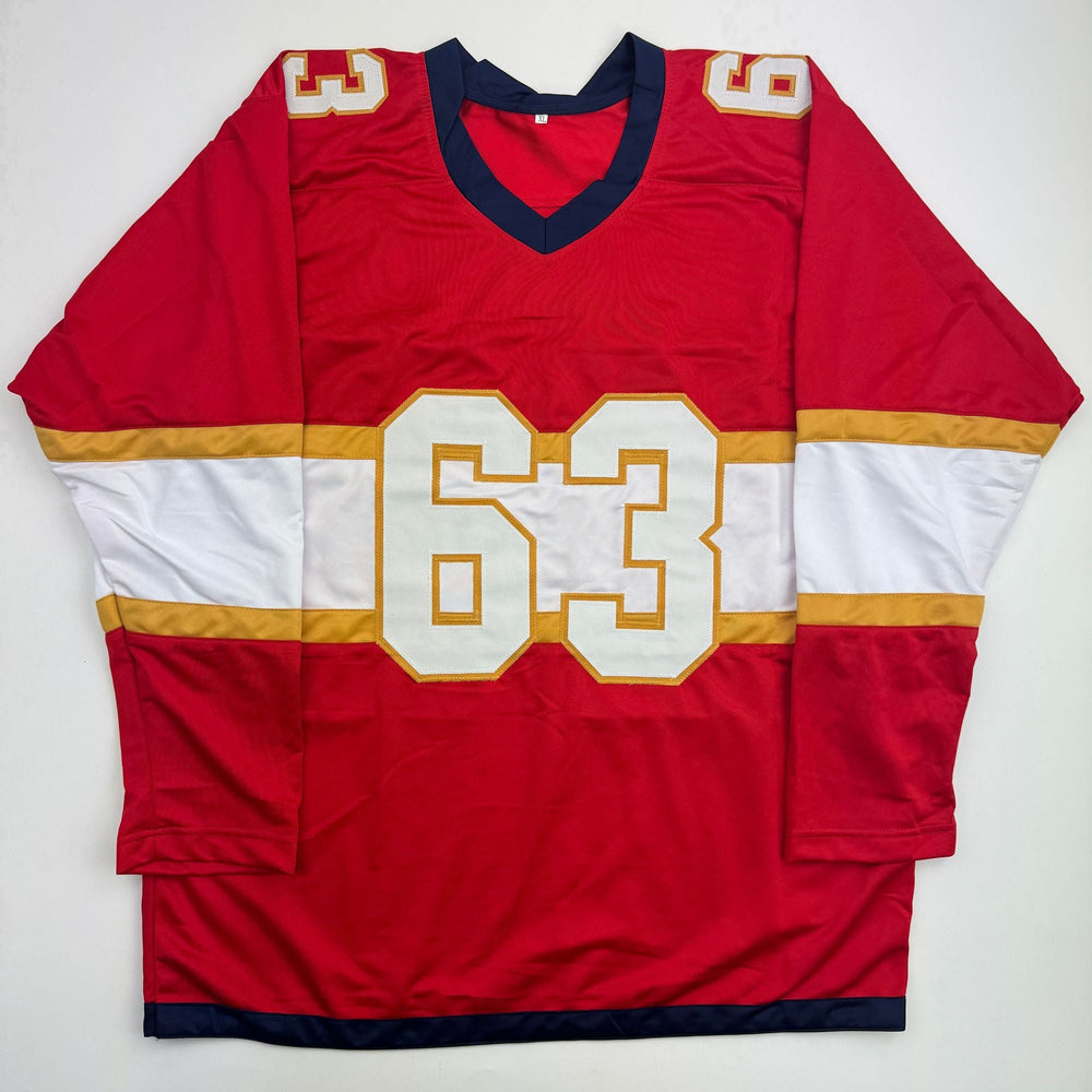 Autographed/Signed Brad Marchand Florida Red Hockey Jersey JSA COA (ONLINE ORDER ONLY)