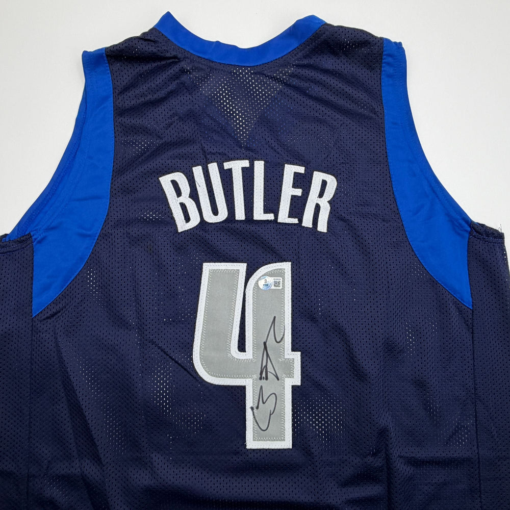 Autographed/Signed Caron Butler Dallas Blue Basketball Jersey Beckett BAS COA (ONLINE ORDER ONLY)