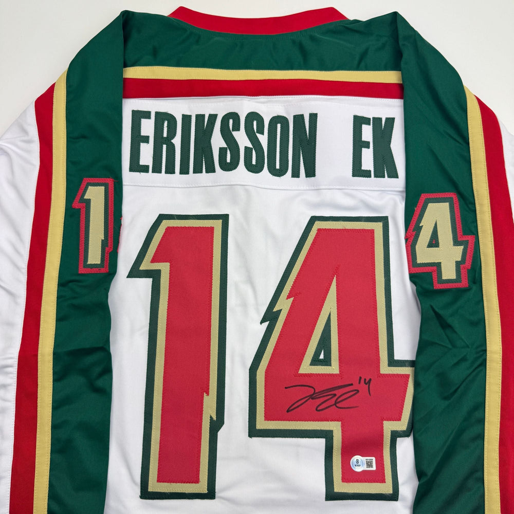 Autographed/Signed Joel Eriksson Ek Minnesota White 25th Anniversary Hockey Jersey Beckett BAS COA (ONLINE ORDER ONLY)