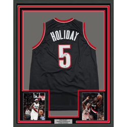 Framed Autographed/Signed Jrue Holiday 35x39 Portland Black Basketball Jersey Beckett BAS COA (ONLINE ORDER ONLY)
