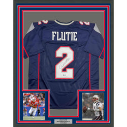Framed Autographed/Signed Doug Flutie 35x39 New England Blue Football Jersey Beckett BAS COA