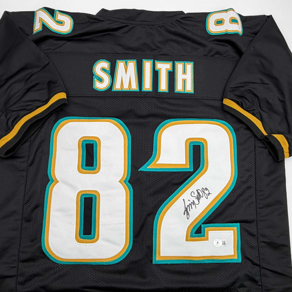 Autographed/Signed Jimmy Smith Jacksonville Black Football Jersey Beckett BAS COA