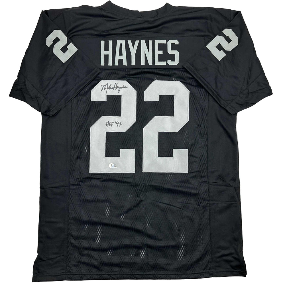 Autographed/Signed Michael Mike Haynes HOF 97 Oakland Black Football Jersey Beckett BAS COA
