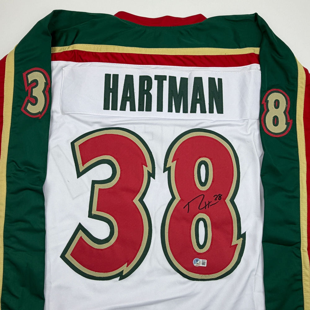 Autographed/Signed Ryan Hartman Minnesota White 25th Anniversary Hockey Jersey Beckett BAS COA (ONLINE ORDER ONLY)
