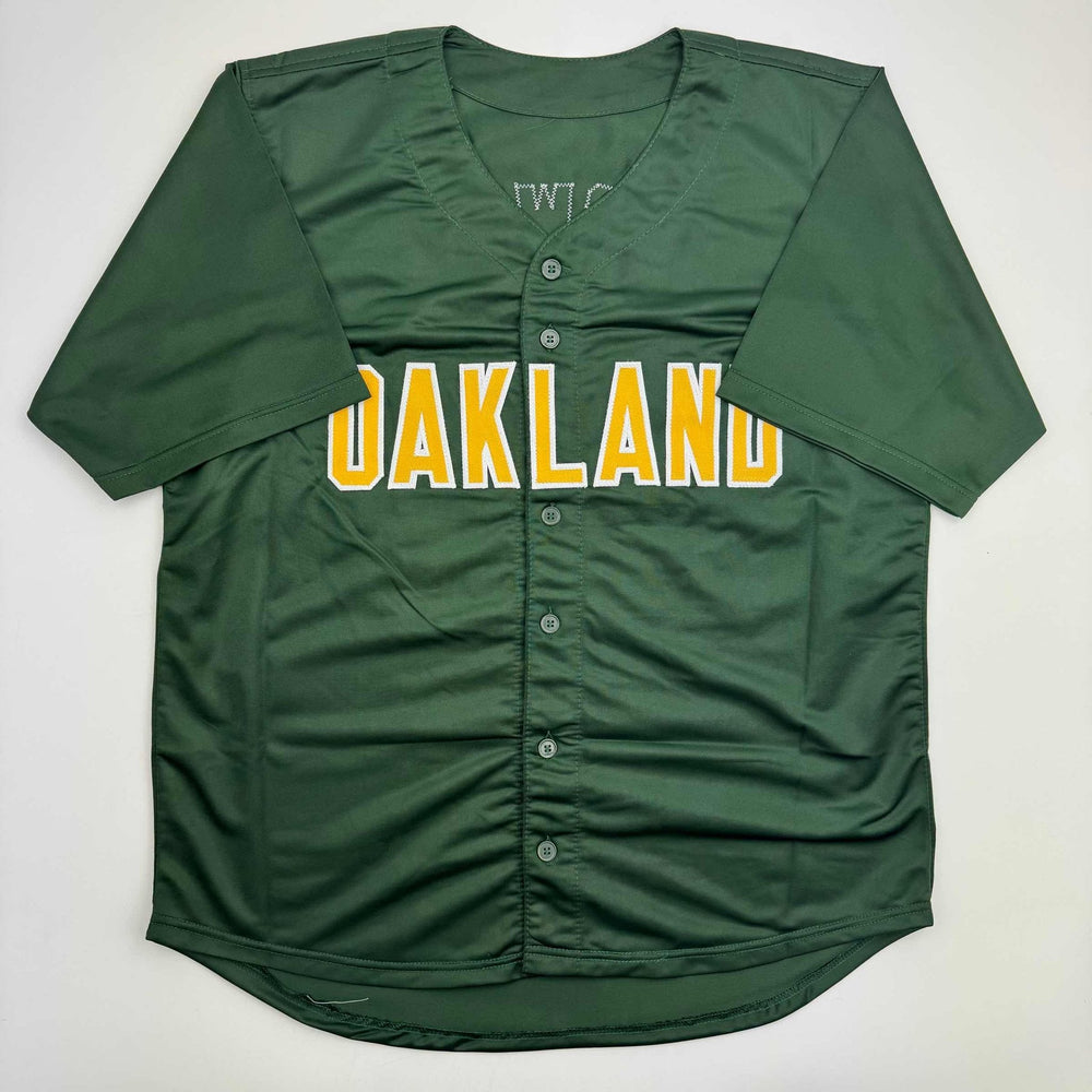 Autographed/Signed Mark McGwire Oakland Green Baseball Jersey Beckett BAS COA