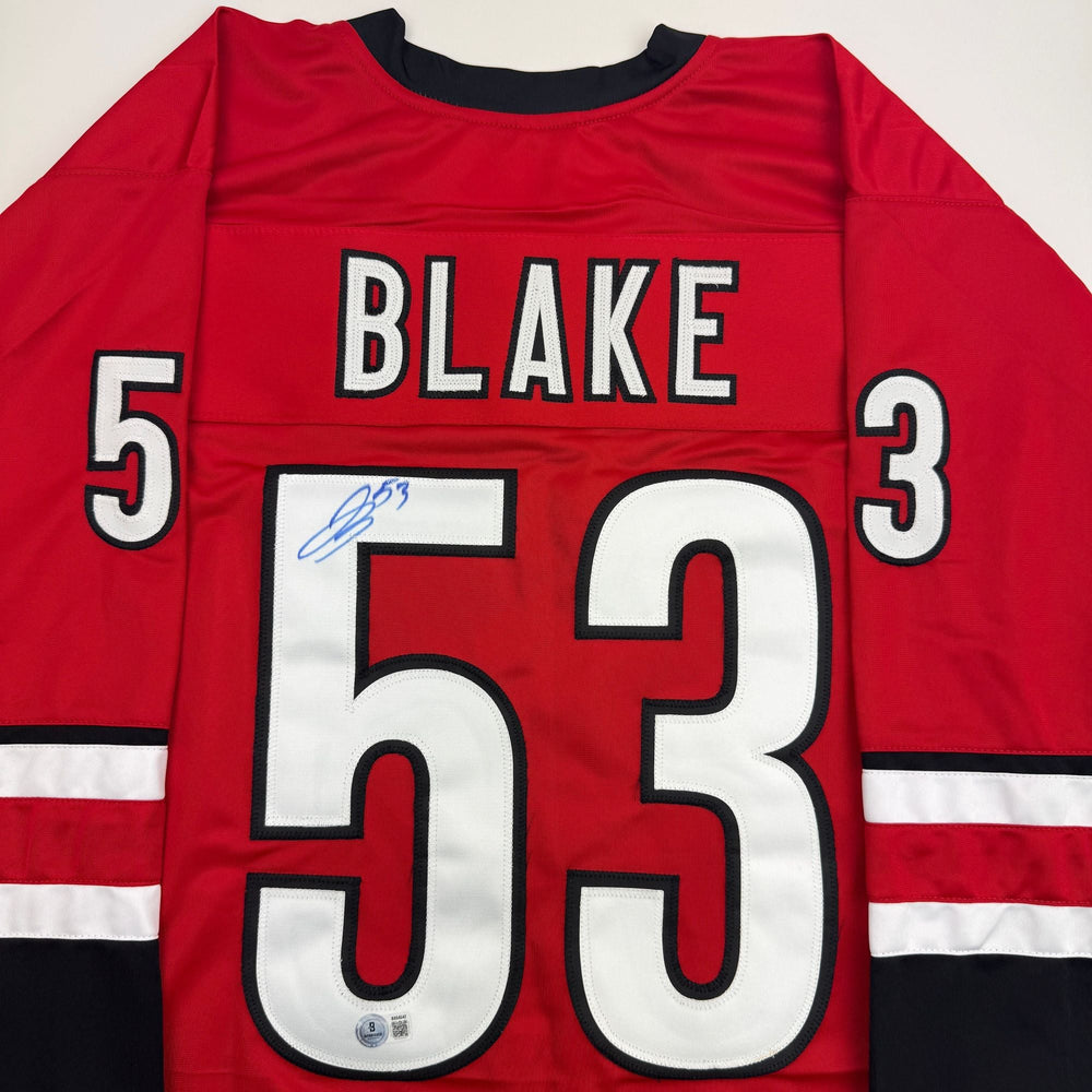 Autographed/Signed Jackson Blake Carolina Red Hockey Jersey Beckett BAS COA (ONLINE ORDER ONLY)