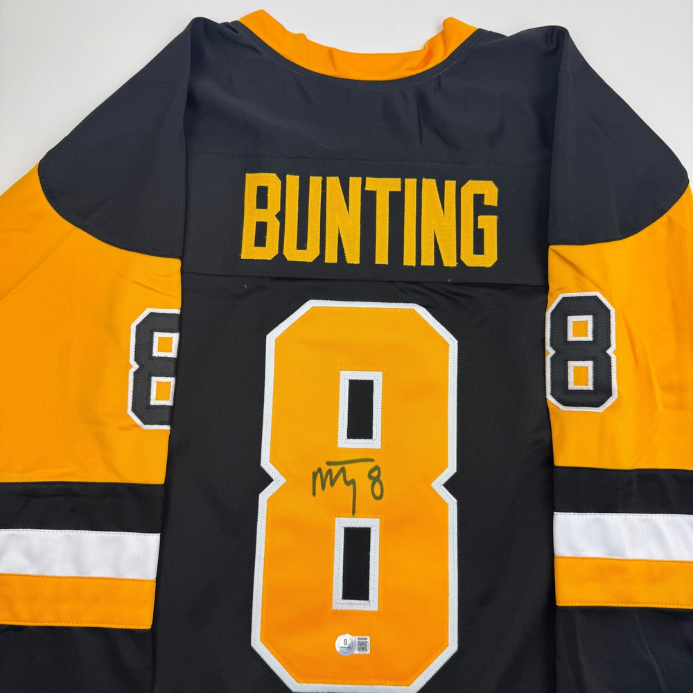 Autographed/Signed Michael Bunting Pittsburgh Black Hockey Jersey Beckett BAS COA (ONLINE ORDER ONLY)