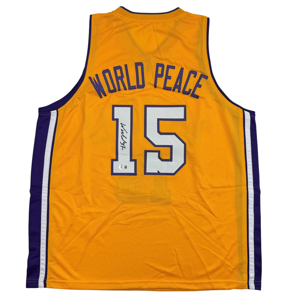 Autographed/Signed Ron Artest Metta World Peace Los Angeles Yellow Basketball Jersey Beckett BAS COA (ONLINE ORDER ONLY)