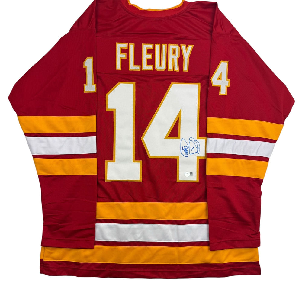 Autographed/Signed Theo Fleury Calgary Red Hockey Jersey Beckett BAS COA (ONLINE ORDER ONLY)