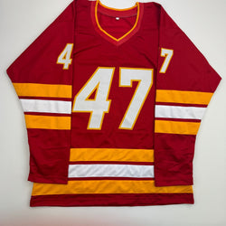 Autographed/Signed Connor Zary Calgary Red Hockey Jersey Beckett BAS COA (ONLINE ORDER ONLY)
