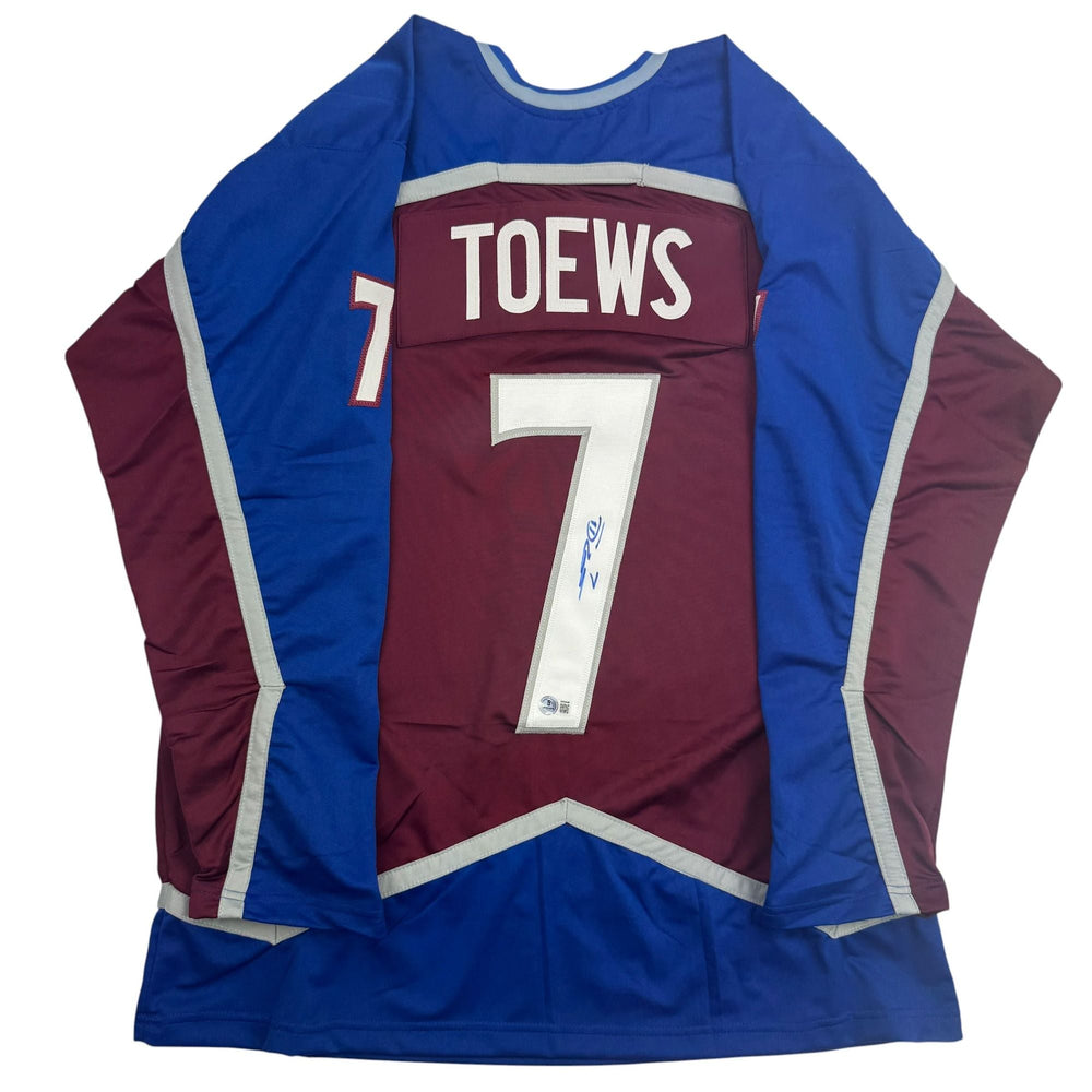 Autographed/Signed Devon Toews Colorado Maroon Hockey Jersey Beckett BAS COA (ONLINE ORDER ONLY)