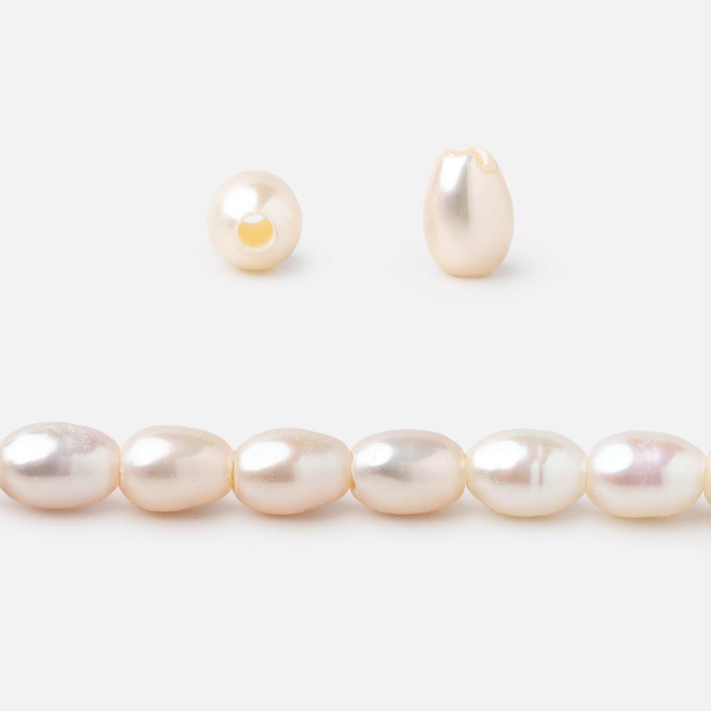 5x4mm Cream Large Hole Oval Freshwater Pearls 1.5mm drill hole 15 inch 64 pcs (ONLINE ORDER ONLY)
