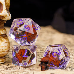 Orange Skull Dice | Clear RPG 7-Dice Set w/ Purple Numbers (Online Only)