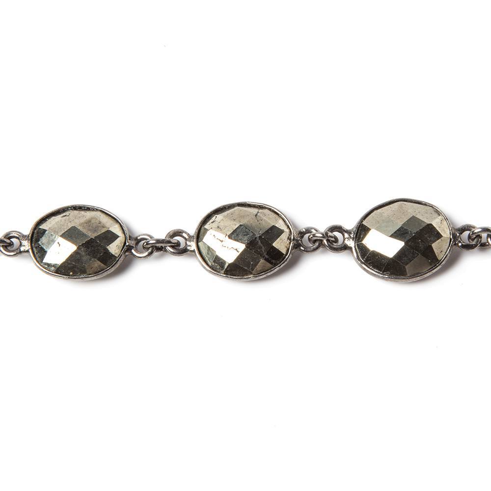 18x9mm Pyrite calibrated facet oval Black Gold Bezeled Chain by the foot 16pcs (ONLINE ORDER ONLY)