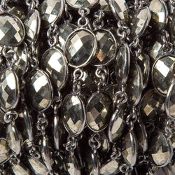 18x9mm Pyrite calibrated facet oval Black Gold Bezeled Chain by the foot 16pcs (ONLINE ORDER ONLY)