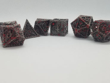 Silver w/Blood Splatter Dragon Strengthened Metal 7-Dice Set (Online Only)