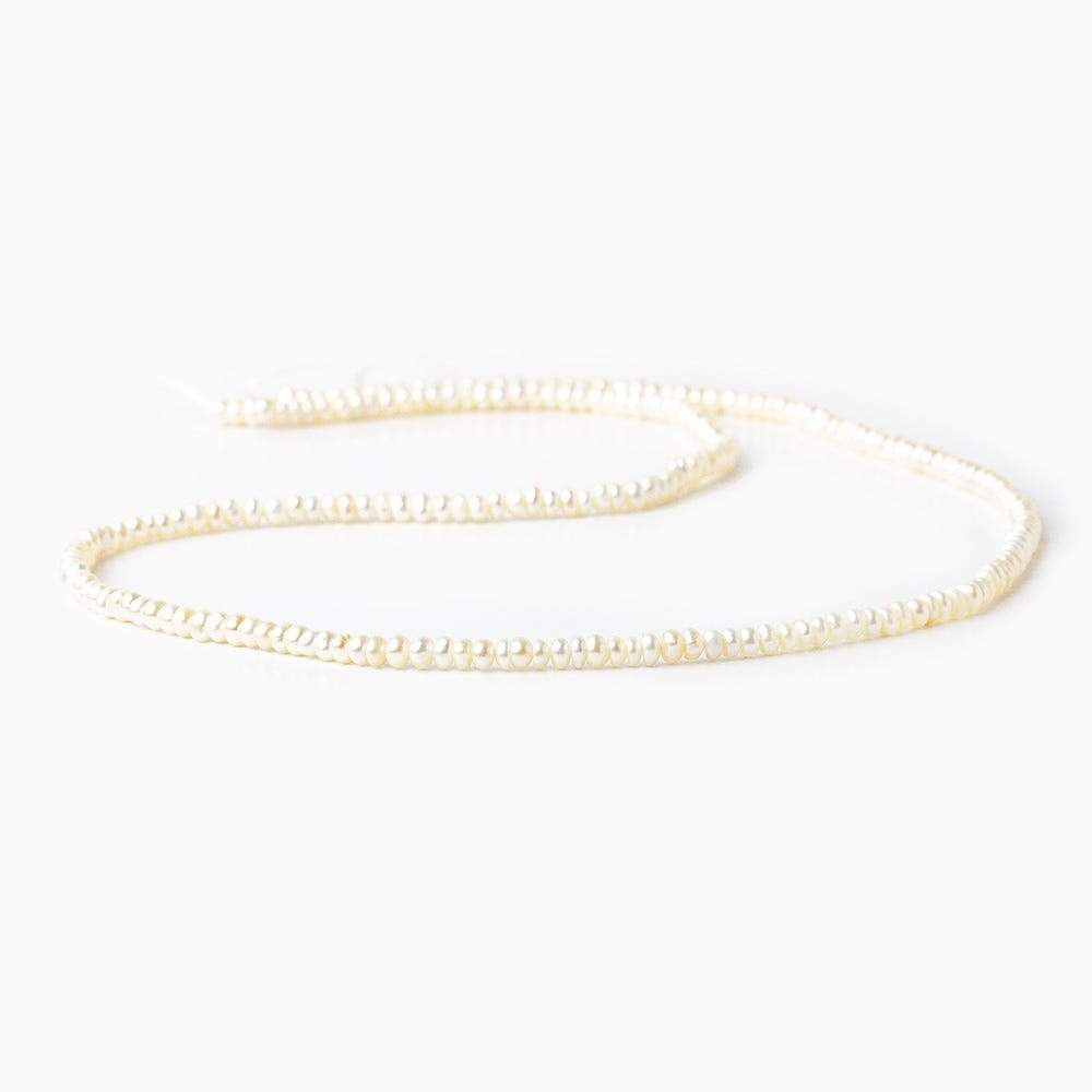 2.5-3mm Off White Center Drilled Button Freshwater Pearl 250 pieces (ONLINE ORDER ONLY)