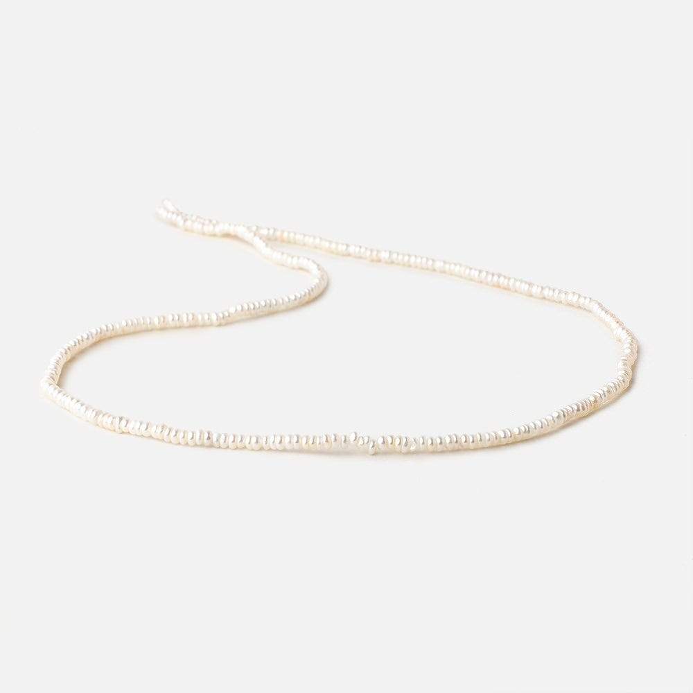 2.5mm Off White Center Drilled Button Freshwater Pearls 15.5 inch 305 pieces (ONLINE ORDER ONLY)