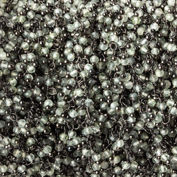 2mm Prehnite micro faceted round Black Gold plated Dangling Chain by the foot (ONLINE ORDER ONLY)