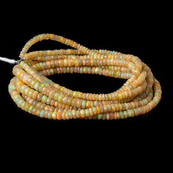 3.5-6.5mm Ethiopian Opal Faceted Rondelles 18 inch 190 beads AAA (ONLINE ORDER ONLY)