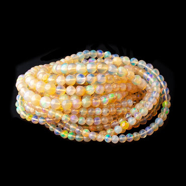 3.5-6mm Golden Ethiopian Opal Plain Round Beads 16 inch 92 pieces AA (ONLINE ORDER ONLY)