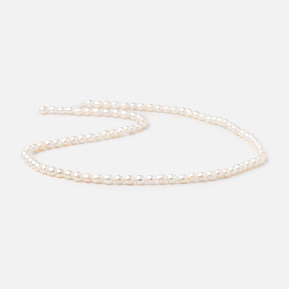 4-4.5mm Creamy White Straight Drill Oval Freshwater Pearls 15.25 inch 98 Beads (ONLINE ORDER ONLY)