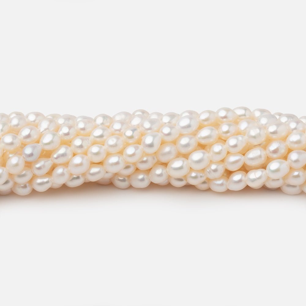 4-4.5mm Creamy White Straight Drill Oval Freshwater Pearls 15.25 inch 98 Beads (ONLINE ORDER ONLY)