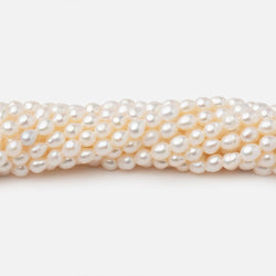 4-4.5mm Creamy White Straight Drill Oval Freshwater Pearls 15.25 inch 98 Beads (ONLINE ORDER ONLY)