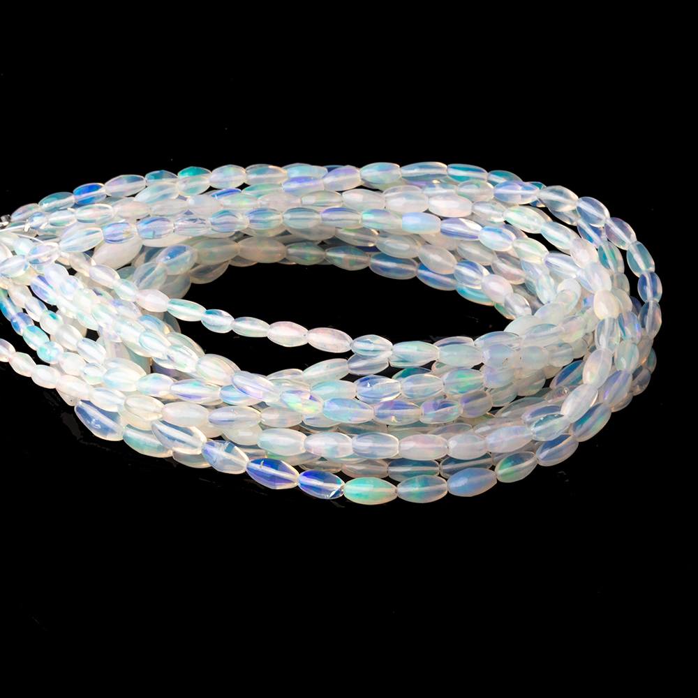4-9.5mm Ethiopian Opal Plain Rice Beads 18 inch 66 pieces AA (ONLINE ORDER ONLY)