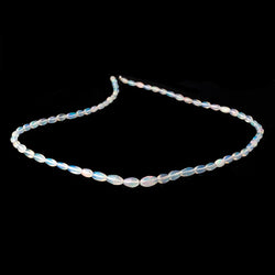 4-9.5mm Ethiopian Opal Plain Rice Beads 18 inch 66 pieces AA (ONLINE ORDER ONLY)
