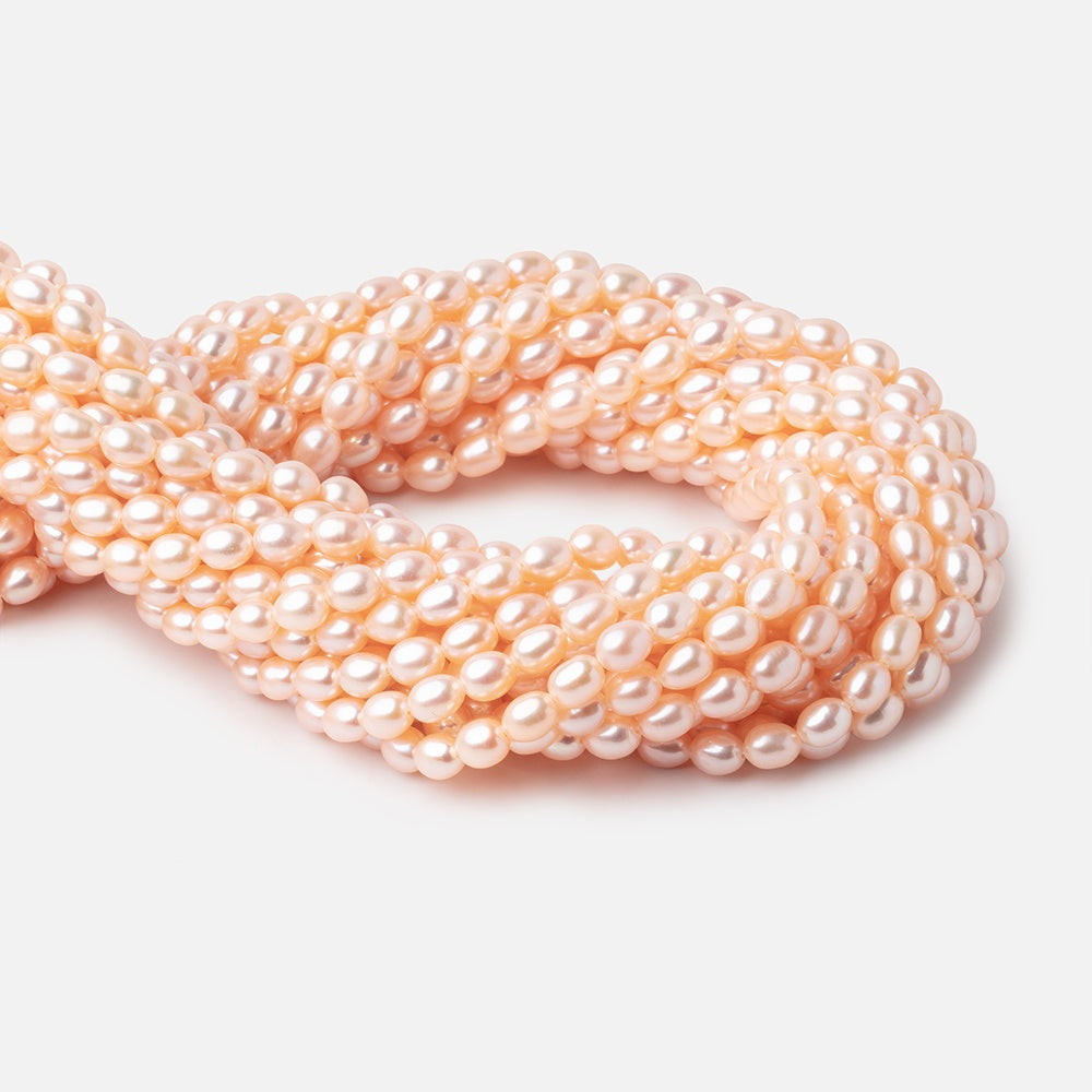 7x5mm Peach Straight Drill Oval Freshwater Pearl 15 inch 56 pcs (ONLINE ORDER ONLY)