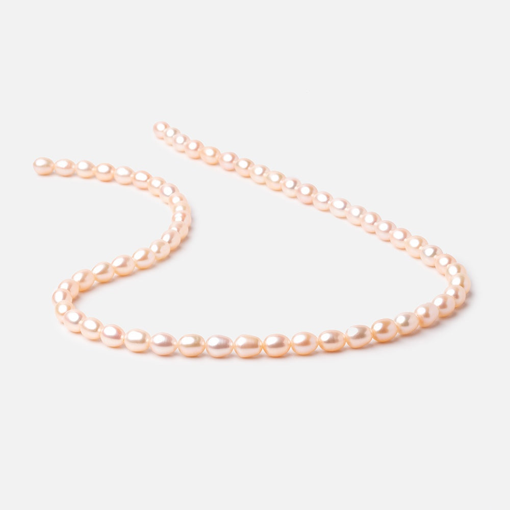 7x5mm Peach Straight Drill Oval Freshwater Pearl 15 inch 56 pcs (ONLINE ORDER ONLY)
