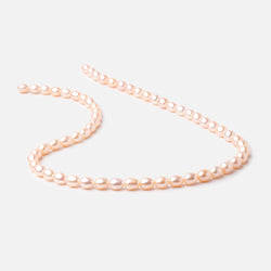 7x5mm Peach Straight Drill Oval Freshwater Pearl 15 inch 56 pcs (ONLINE ORDER ONLY)