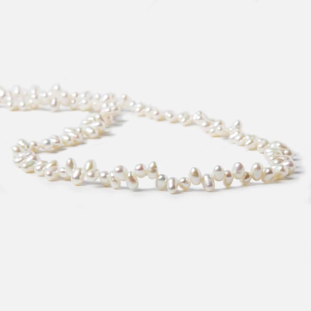 3x5mm White Top Drilled Oval Freshwater Pearls 16 inch 141 pieces (ONLINE ORDER ONLY)