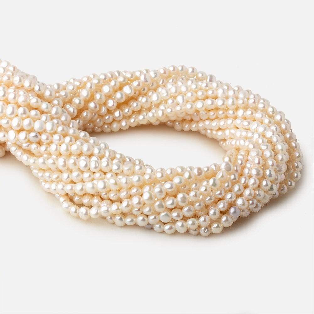 4.5x4-5x4mm Off White side drilled Baroque freshwater pearls 16 inch 90 pieces A (ONLINE ORDER ONLY)