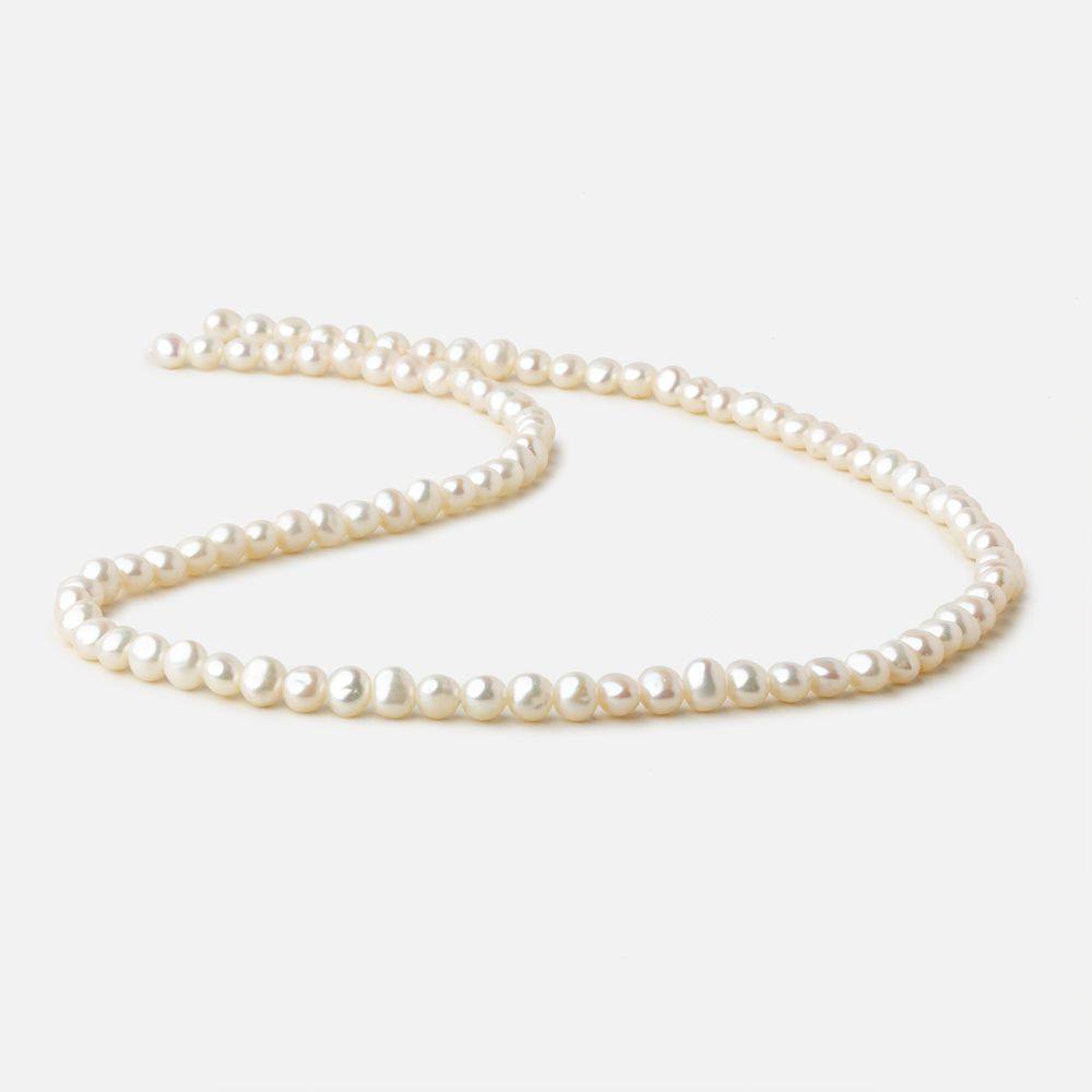 4.5x4-5x4mm Off White side drilled Baroque freshwater pearls 16 inch 90 pieces A (ONLINE ORDER ONLY)