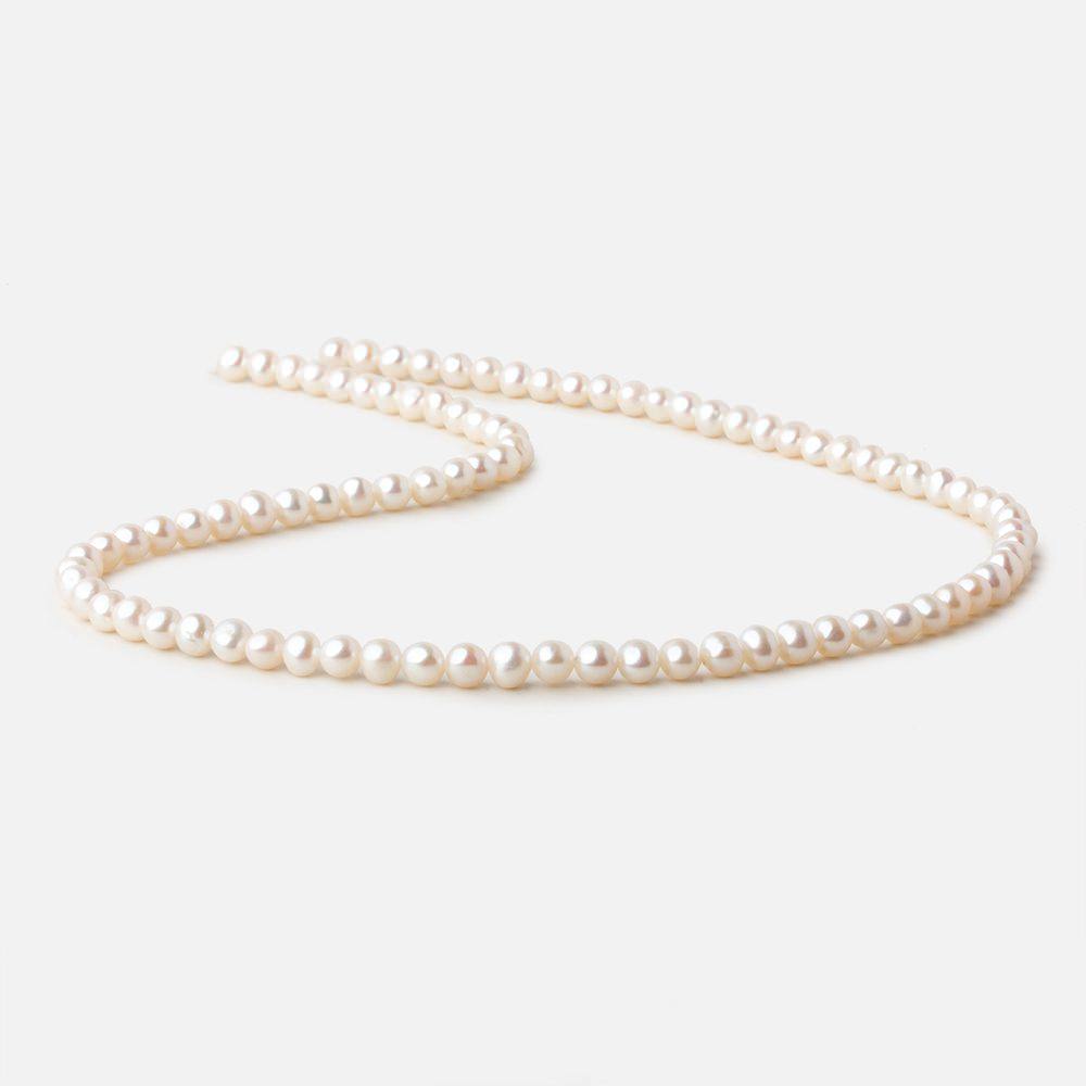 4.5x4.5mm Off White side drilled Baroque freshwater pearls 16 inch 89 pieces A (ONLINE ORDER ONLY)