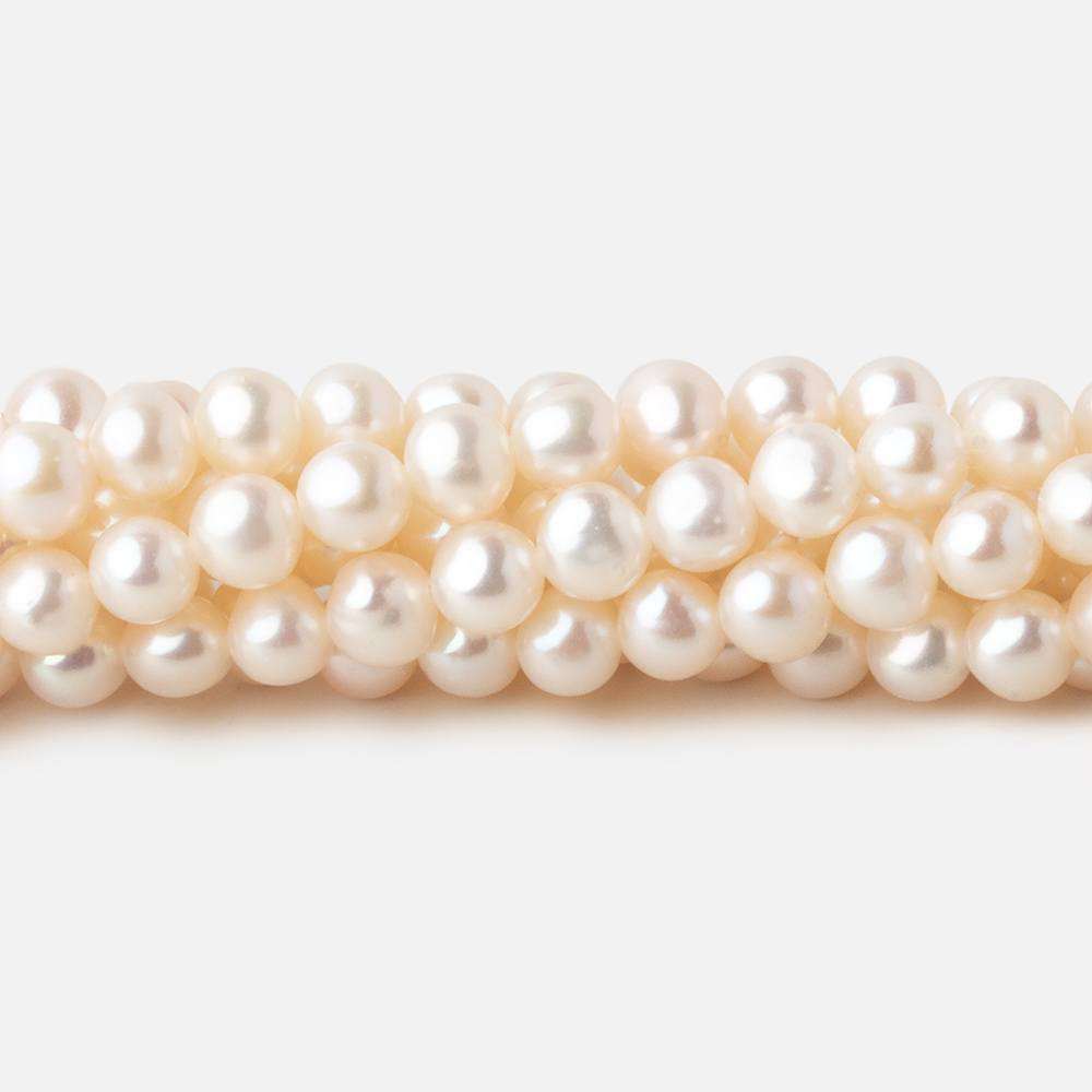 4.5x4.5mm Off White side drilled Baroque freshwater pearls 16 inch 89 pieces A (ONLINE ORDER ONLY)